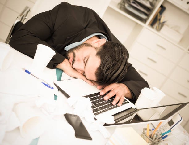 istock Businessman is resting after productive work day 897969336