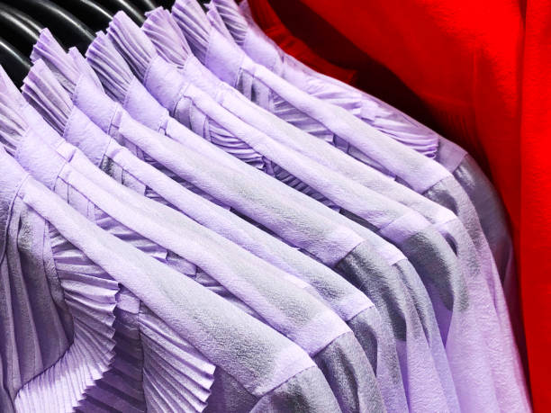 istock Womens shirts on the hanger in the store. 897975682