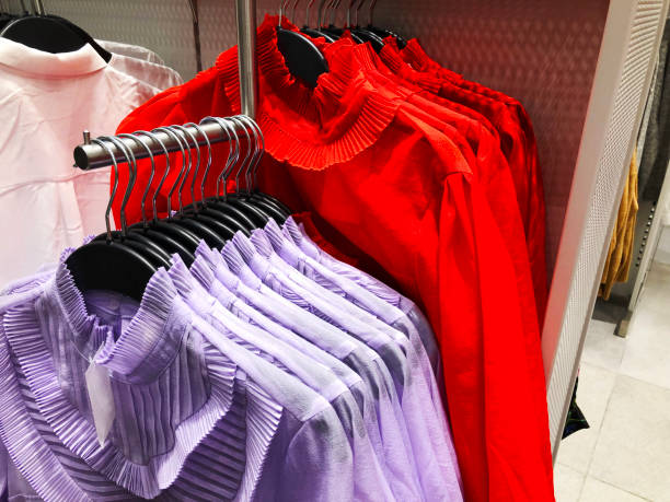 istock Womens shirts on the hanger in the store. 897975866