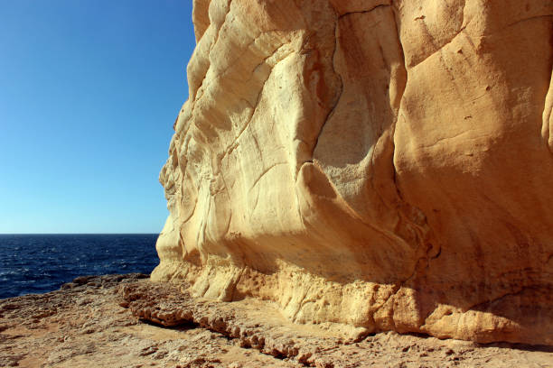 istock Maritime landscape: Cliffs and coastline around the Blue Grotto, Malta. Strong swell 897976434