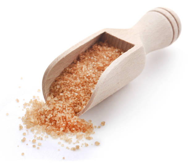 istock Brown sugar with wooden scoop 897976812