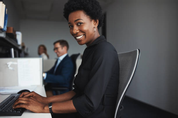 istock Typing her way to a productive day 897976954