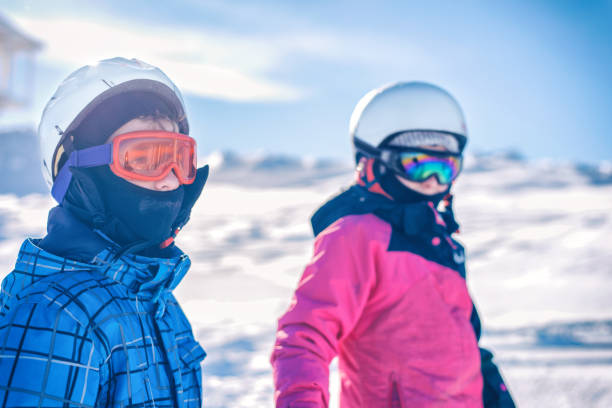 istock Kids skiing in the mountains 897983058