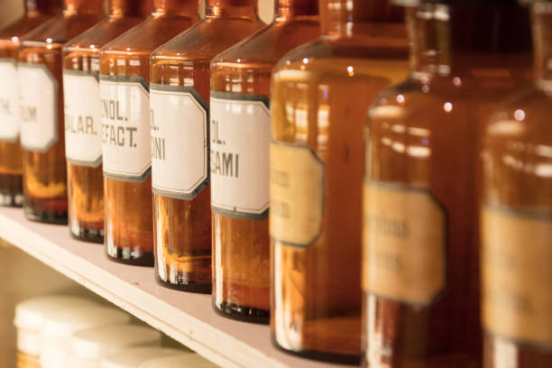 istock Glass bottles filled with chemicals 897983074