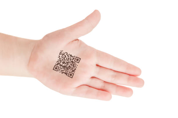 istock Child hand with QR code of genetic experiments. Clone of DNA and human genome. Artificial intelligence. 897983292
