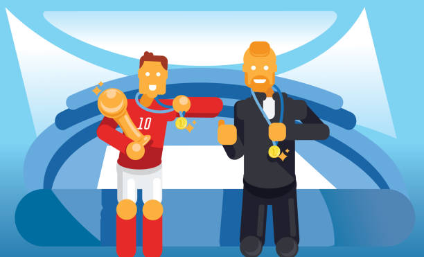 istock trainer and soccer player celebrate with trophy and winner coin 897988658