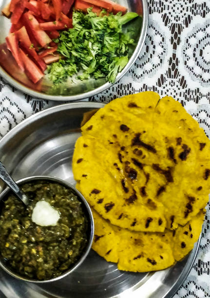 istock famous punjabi cuisine - sarson ka saag and makki di roti 898001144