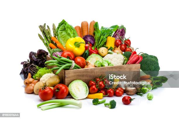 Healthy Fresh Vegetables In A Wooden Crate Isolated On White Background Stock Photo - Download Image Now