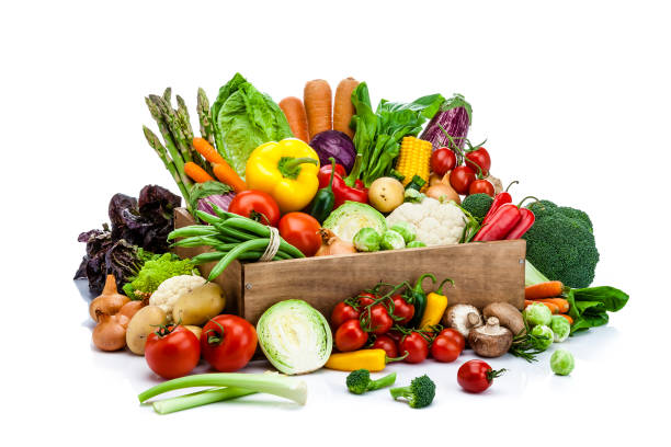 healthy fresh vegetables in a wooden crate isolated on white background - cauliflower vegetable white isolated imagens e fotografias de stock