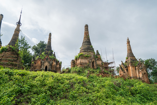 Ancient temples covered by plants, Inle lake, Myanmar 