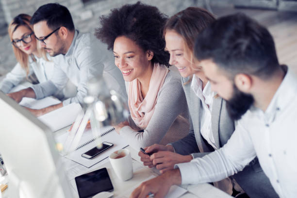istock Successful business group working at the office 898014818
