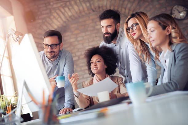istock Successful business group working at the office 898015052