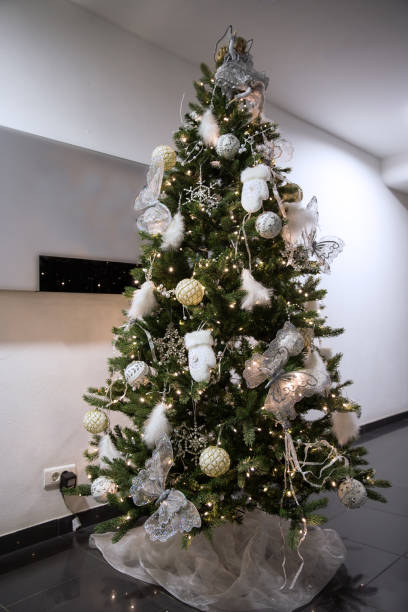 istock Toys and decorative box on the Christmas tree 898018340