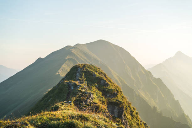 istock Trekking in the mountains during sunrise 898039042