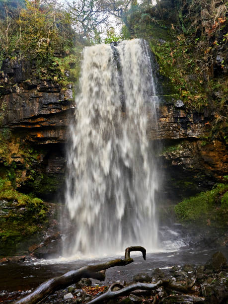 istock Henrhyd Falls Waterfall – The Batcave Entrance! 898043286