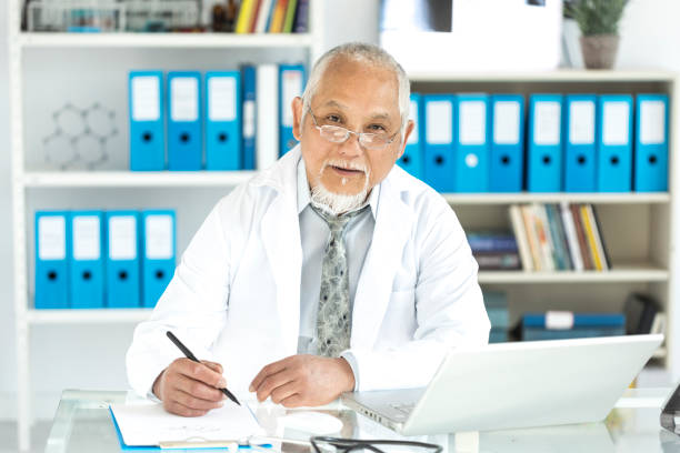 istock Mature asian doctor in his cabin 898044732