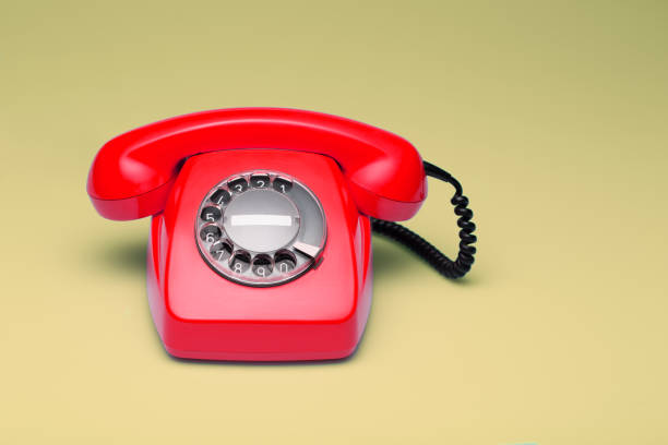 istock Red telephone in retro style. 898063442