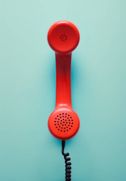 istock Red telephone in retro style. 898065834
