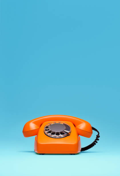istock Telephone in retro style on blue background. 898065890