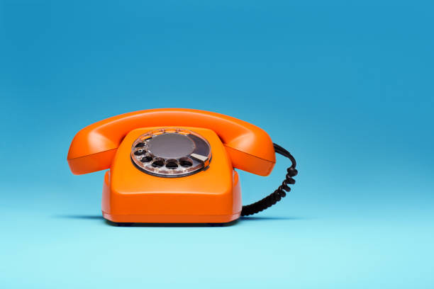 istock Telephone in retro style on blue background. 898066146