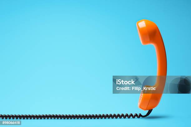 Telephone In Retro Style On Blue Background Stock Photo - Download Image Now - Telephone, Old, Retro Style