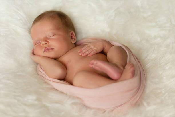 istock Sleeping newborn girl 898067026