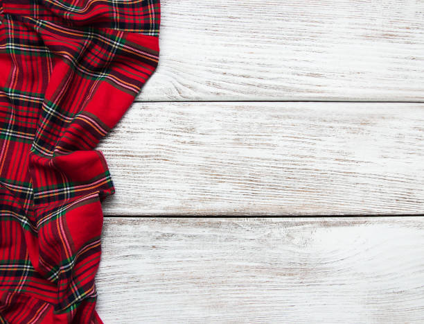 istock Checkered napkin on a wooden background 898070742