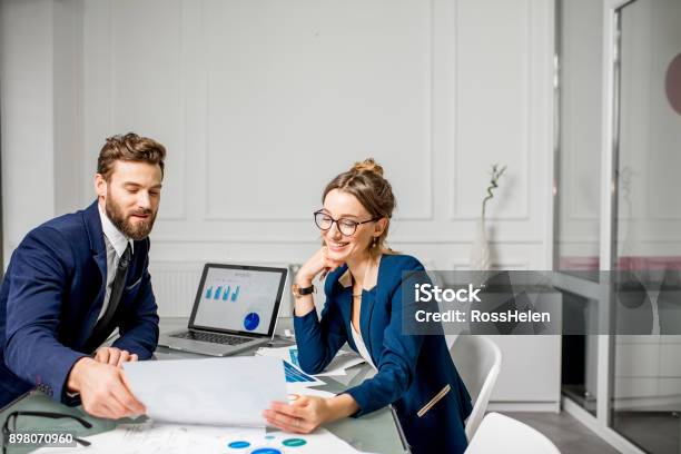 Analytic Managers Team Working At The Office Stock Photo - Download Image Now - Finance, Accountancy, Business