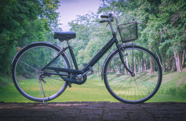 istock Vintage bicycle parked on the road. Cool tone. 898073854