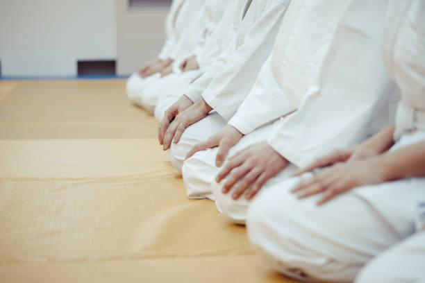 istock students sitting in a kimono in the gym 898073900