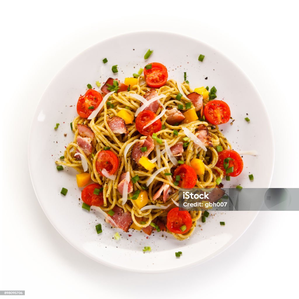 Pasta with meat, tomato sauce and vegetables Pasta with meat, tomato sauce and vegetables on white background White Background Stock Photo