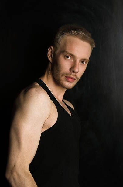 istock portrait of a man in black 898103198