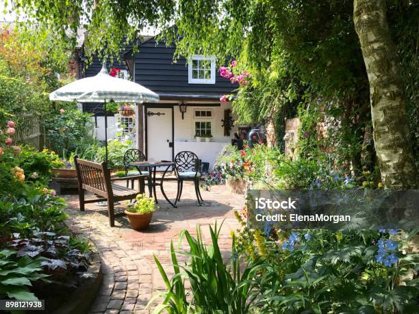 An English Cottage Garden Stock Photo - Download Image Now - Yard - Grounds, Cottage, UK