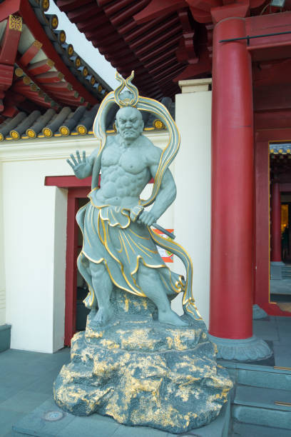 chinese god statue at  buddha tooth relic temple and museum at chinatown in singapore - dragon china singapore temple imagens e fotografias de stock