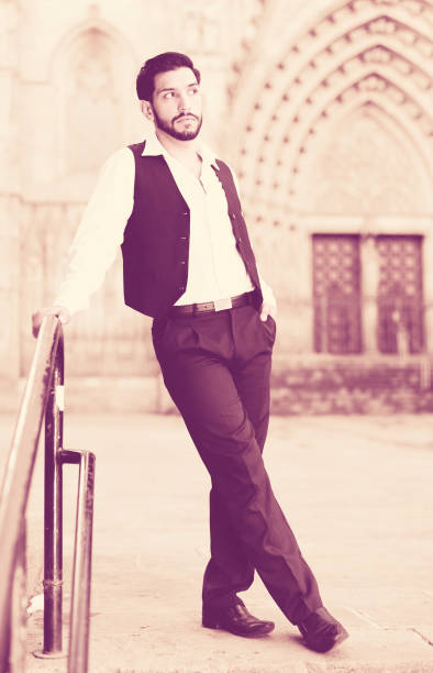 istock Confident man posing near iron banisters 898140120