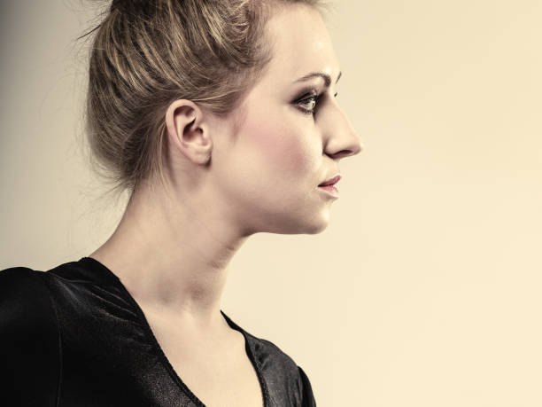 istock beautiful pensive woman face 898142620