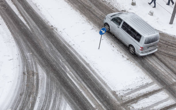 istock Car on road covered with snow 898145702