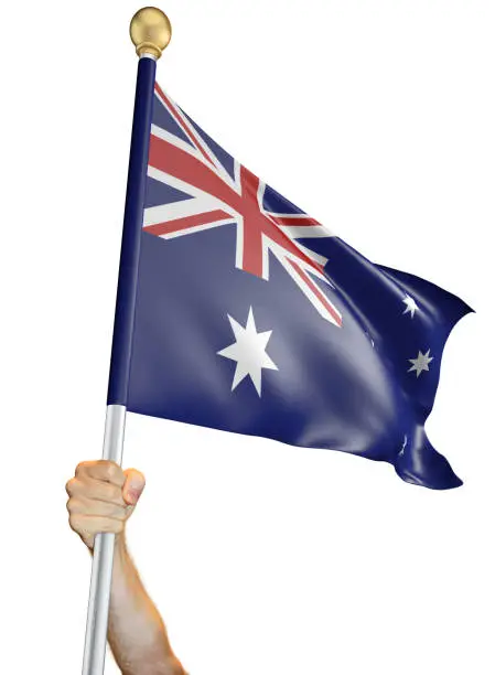 Man's hand holding a flag pole with the Australian national flag proudly displayed against a white background. The flag has been rendered with 3D software.