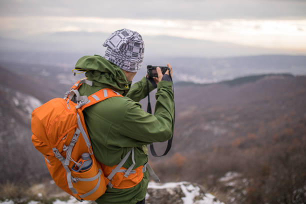 istock Photographer hiker in nature 898152916