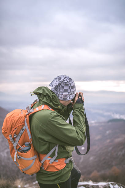 istock Photographer hiker in nature 898159560