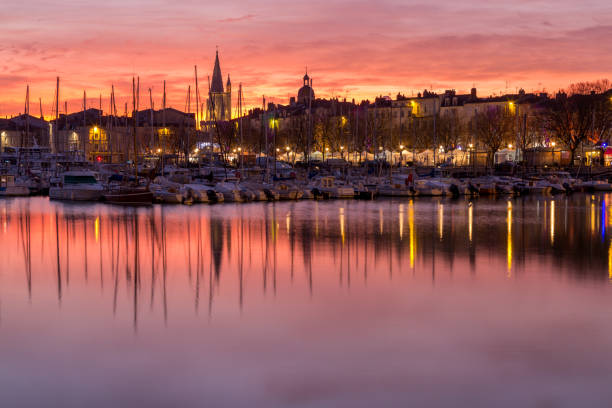 istock La Rochelle - Harbor by night with beautiful sunset 898165238