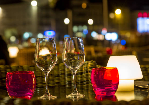 istock table decoration with wine and coloreful water glasses 898165240