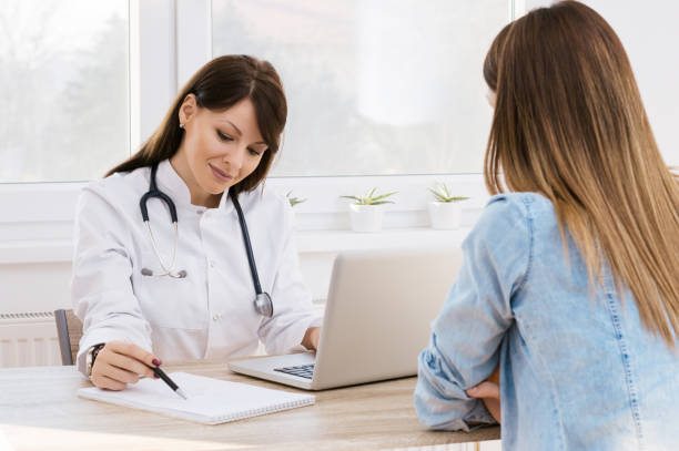 istock Patient Having Consultation With Doctor In Office 898165324