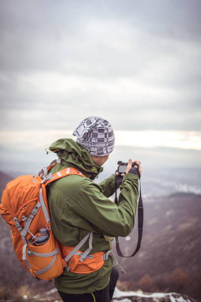 istock Photographer hiker in nature 898168530