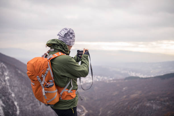 istock Photographer hiker in nature 898169200