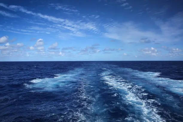 Photo of Wake of a ship across the Atlantic Ocean, on a beautiful day.