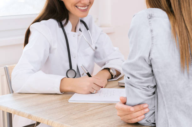 istock Doctor and patient discussing. 898172418