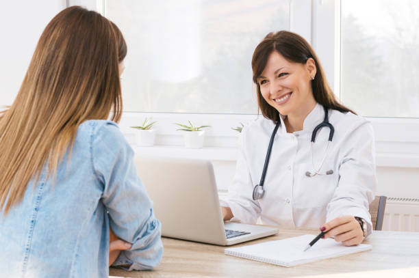 istock Doctor and patient discussing. 898172466