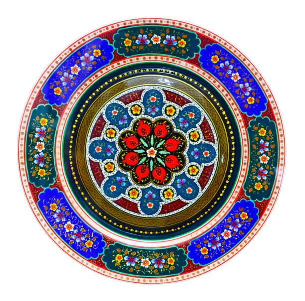 istock Eastern carved, colored ornament on a wooden plate 898182280