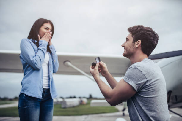 Couple near plane.